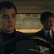 Alfred Pennyworth and Thomas Wayne sitting in a car.